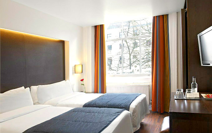 A typical quad room at Caesar Hotel London