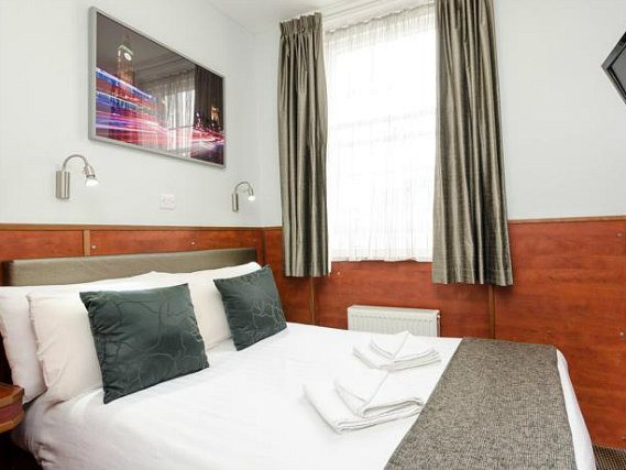 Rest easy in a comfortable bed in your room at Wardonia Hotel