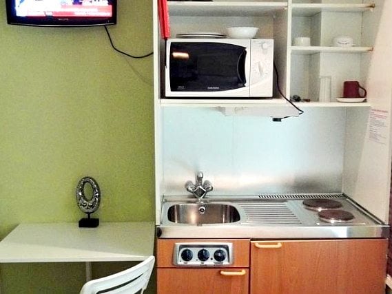 Save even more money by preparing your own food in the self-catering kitchen at Dylan Kensington