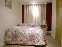 A double room at 109 Warwick House Studios - all rooms feature private bathrooms and a kitchenette