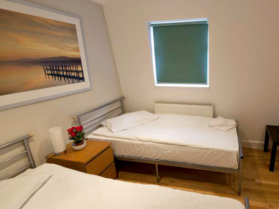 A twin room at 146 Suites Gloucester Place is perfect for two guests