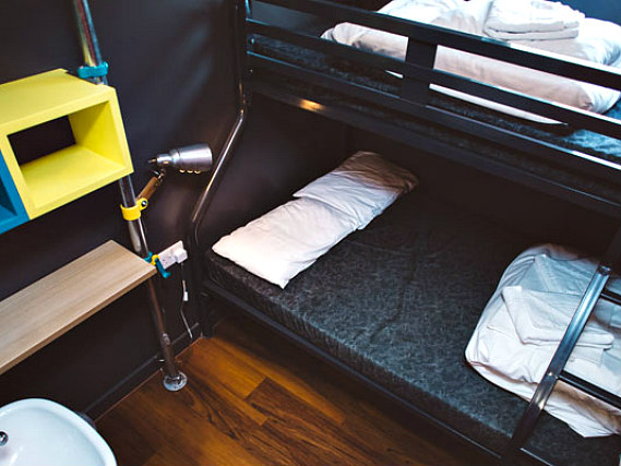 Rest easy in a comfortable bed in your room at Clink78