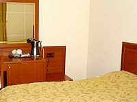 Una tipica camera doppia delCorner House Hotel