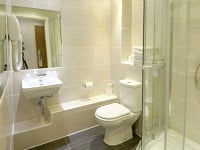 A typical bathroom at Ambassadors Hotel London Kensington