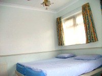 A typical simply furnished double ensuite room