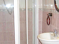 Bathrooms at Abbey Hotel London are clean and bright