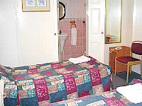 A Twin room at Abbey Hotel London