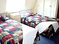 A typical Twin room at Abbey Hotel London - airy and comfortable