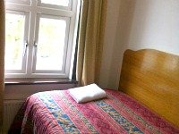 A typical Single room at Abbey Hotel London - airy and comfortable