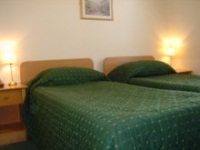 A Typical Twin Bedroom at London Town Hotel