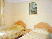 A typical twin room at Acton Town Hotel