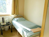 A typical twin room at Hour Glass Hotel