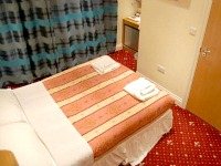 A cosy, warm double room at the Anchor House Hotel
