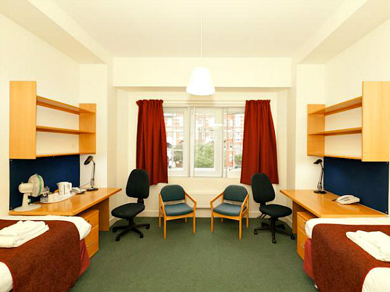 A twin room at Beit Hall London is perfect for two guests