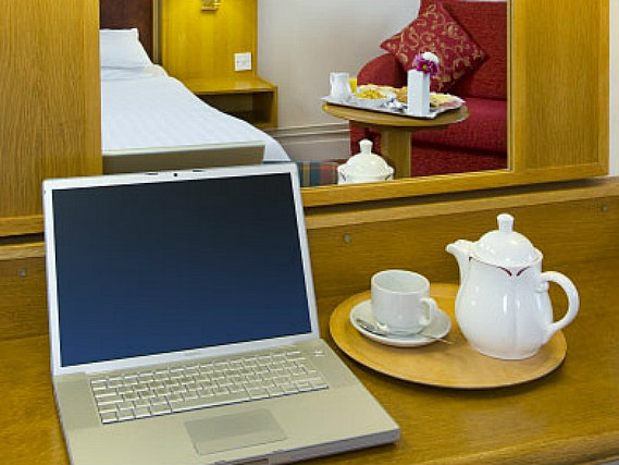 Enjoy a hot drink thanks to the tea/coffee making facilities in your room at Master Robert Hotel