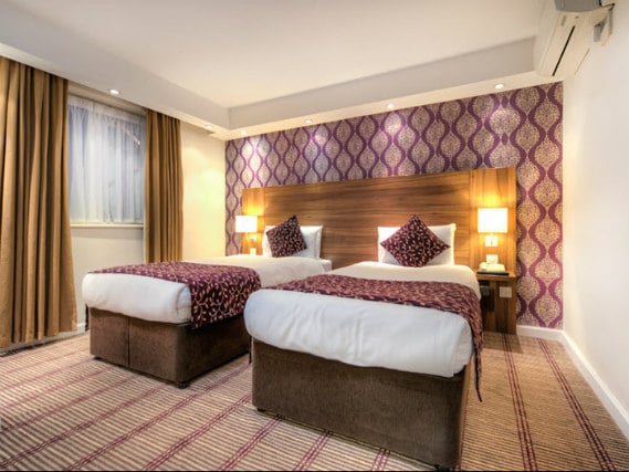 A typical twin room at City Continental London Kensington