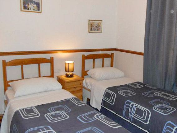 A twin room at Hotel Meridiana is perfect for two guests